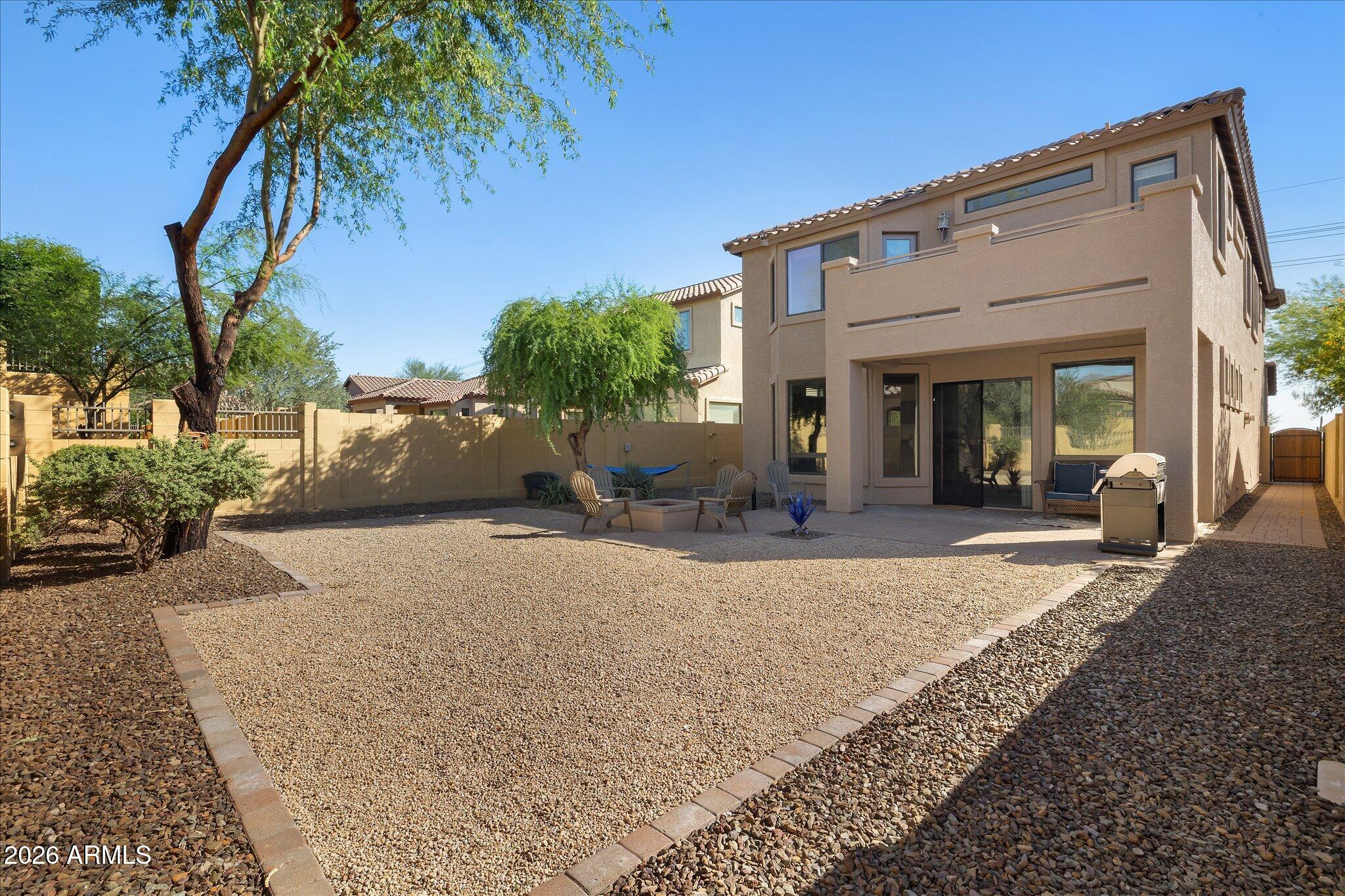 8536 East Inca Street Mesa, AZ 85207 - Photo 36 of 44 a view of a house with a patio
