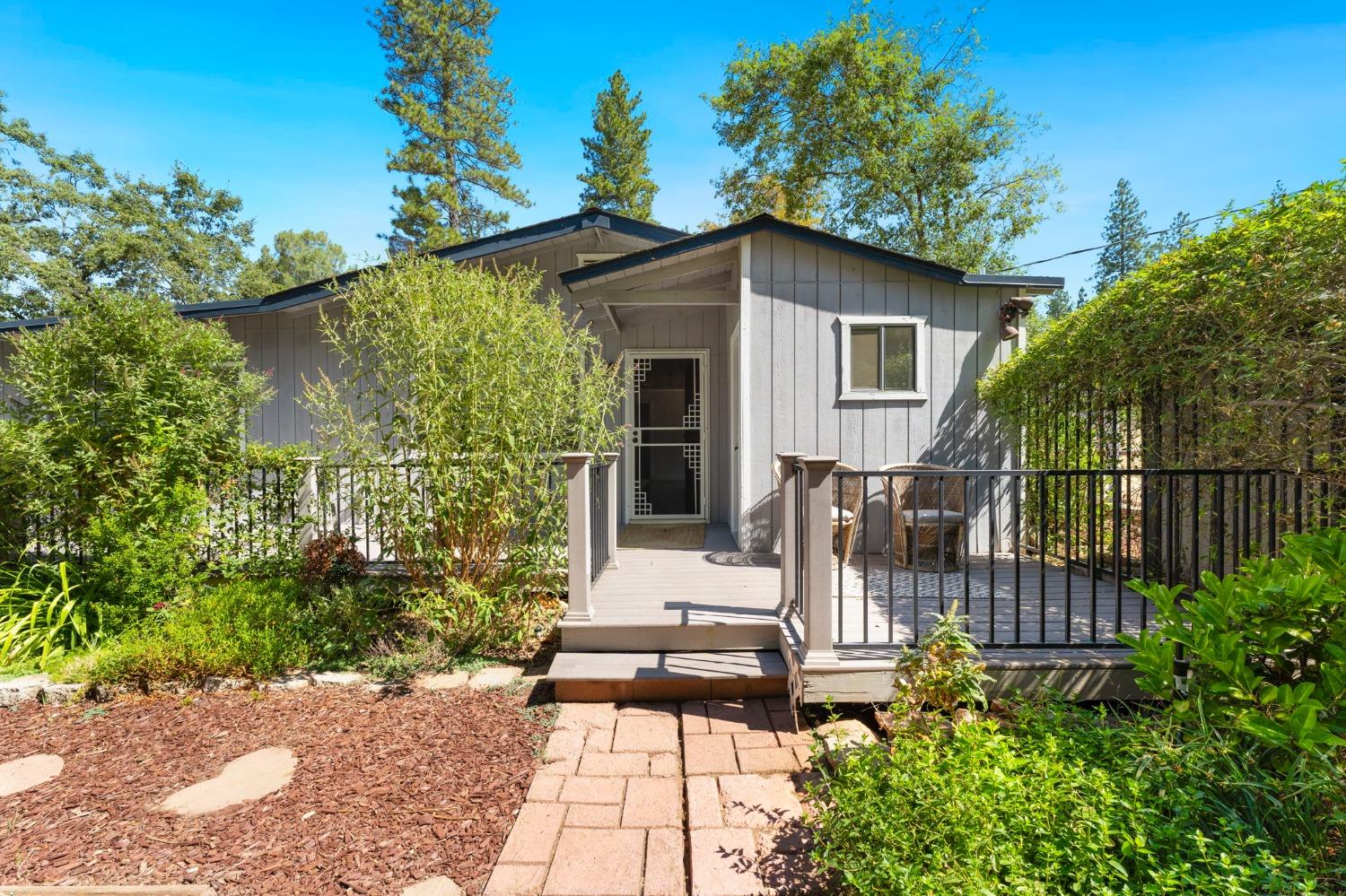 300 Higdon Spink Road West Point, CA 95255 - Photo 1 of 1 a front view of a house with garden