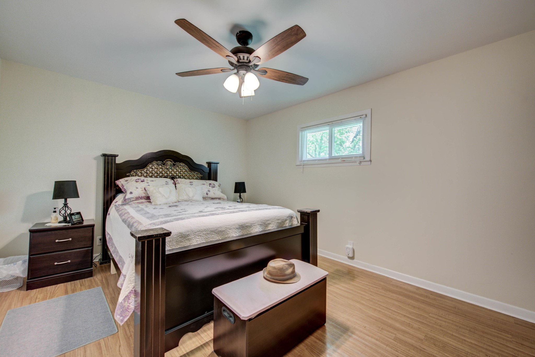 517 Foust Carney Road Powell, TN 37849 - Photo 12 of 28 a bedroom with a bed and wooden floor