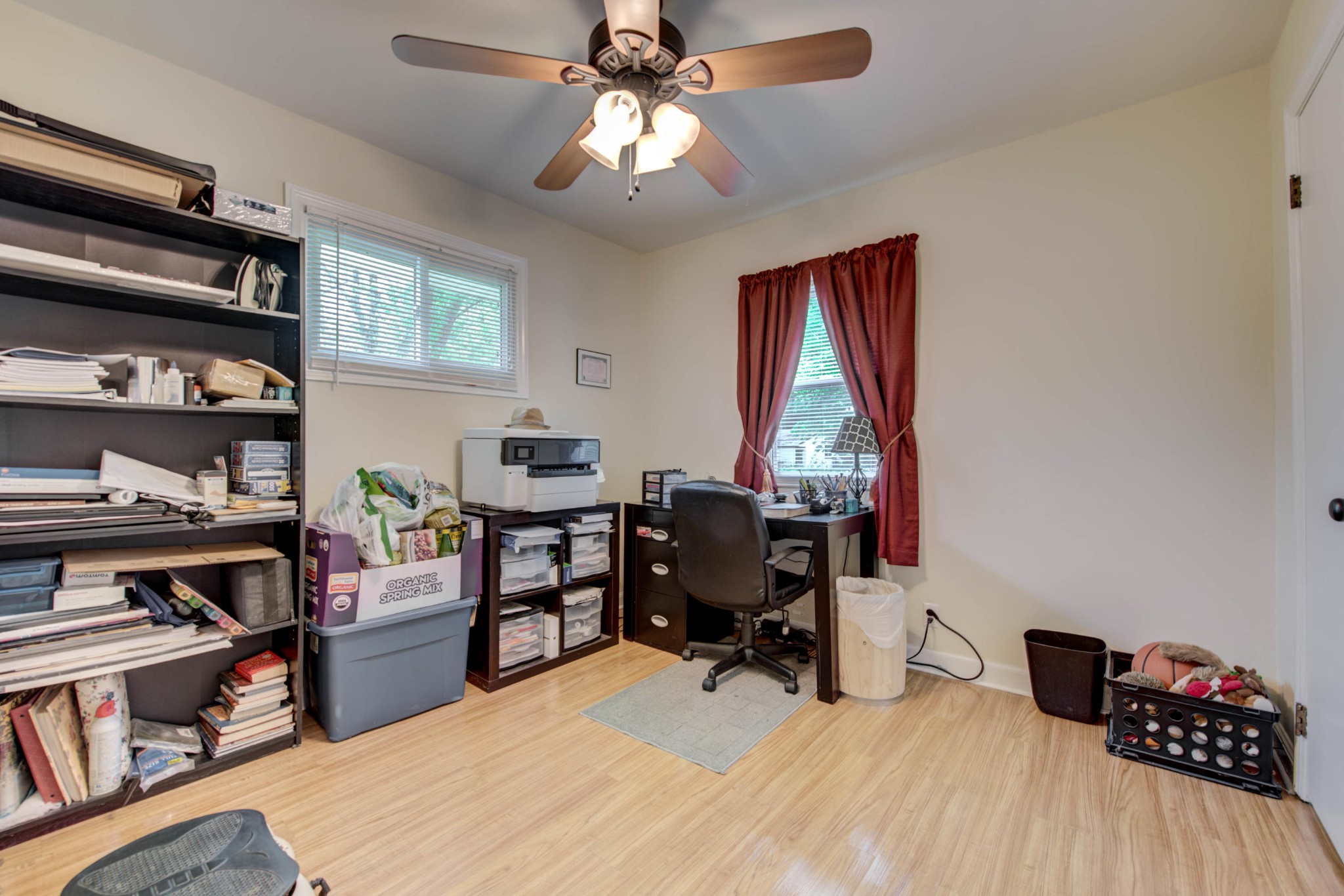 517 Foust Carney Road Powell, TN 37849 - Photo 14 of 28 a workspace with furniture bookshelf and a window