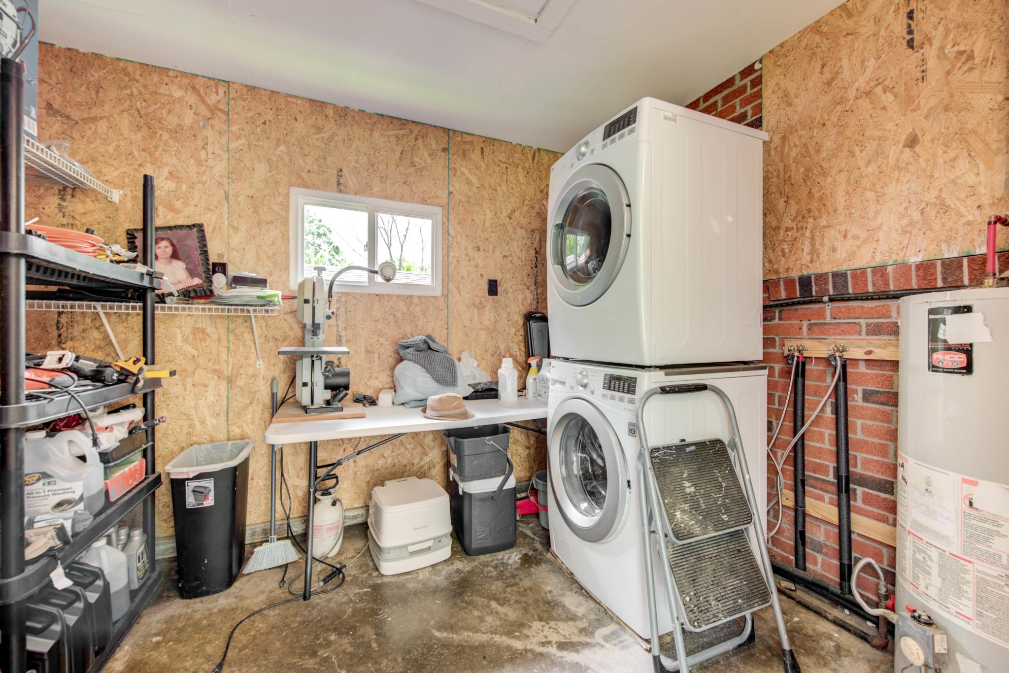 517 Foust Carney Road Powell, TN 37849 - Photo 19 of 28 a utility room with dryer washer and a view of living area