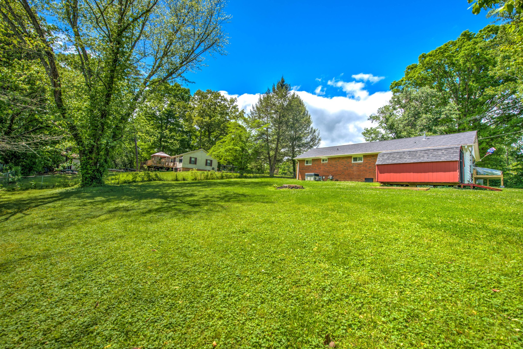 517 Foust Carney Road Powell, TN 37849 - Photo 21 of 28 a view of a big yard with a large tree