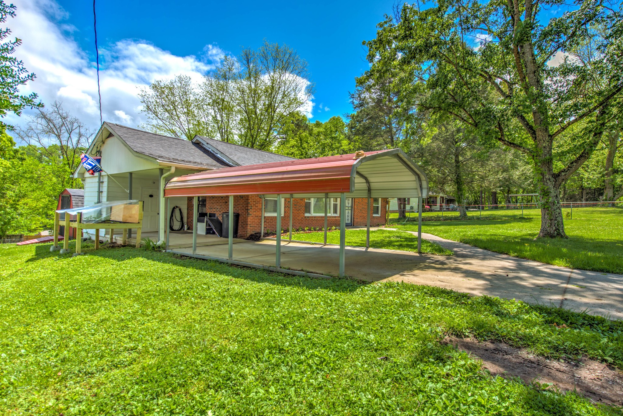 517 Foust Carney Road Powell, TN 37849 - Photo 23 of 28 a front view of a house with yard patio and green space