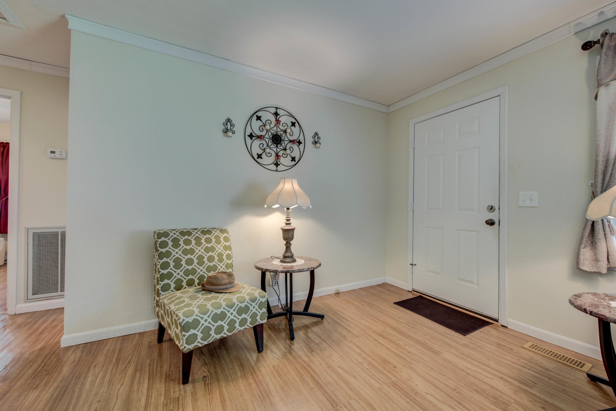 517 Foust Carney Road Powell, TN 37849 - Photo 4 of 28 a view of a room with wooden floor and workspace