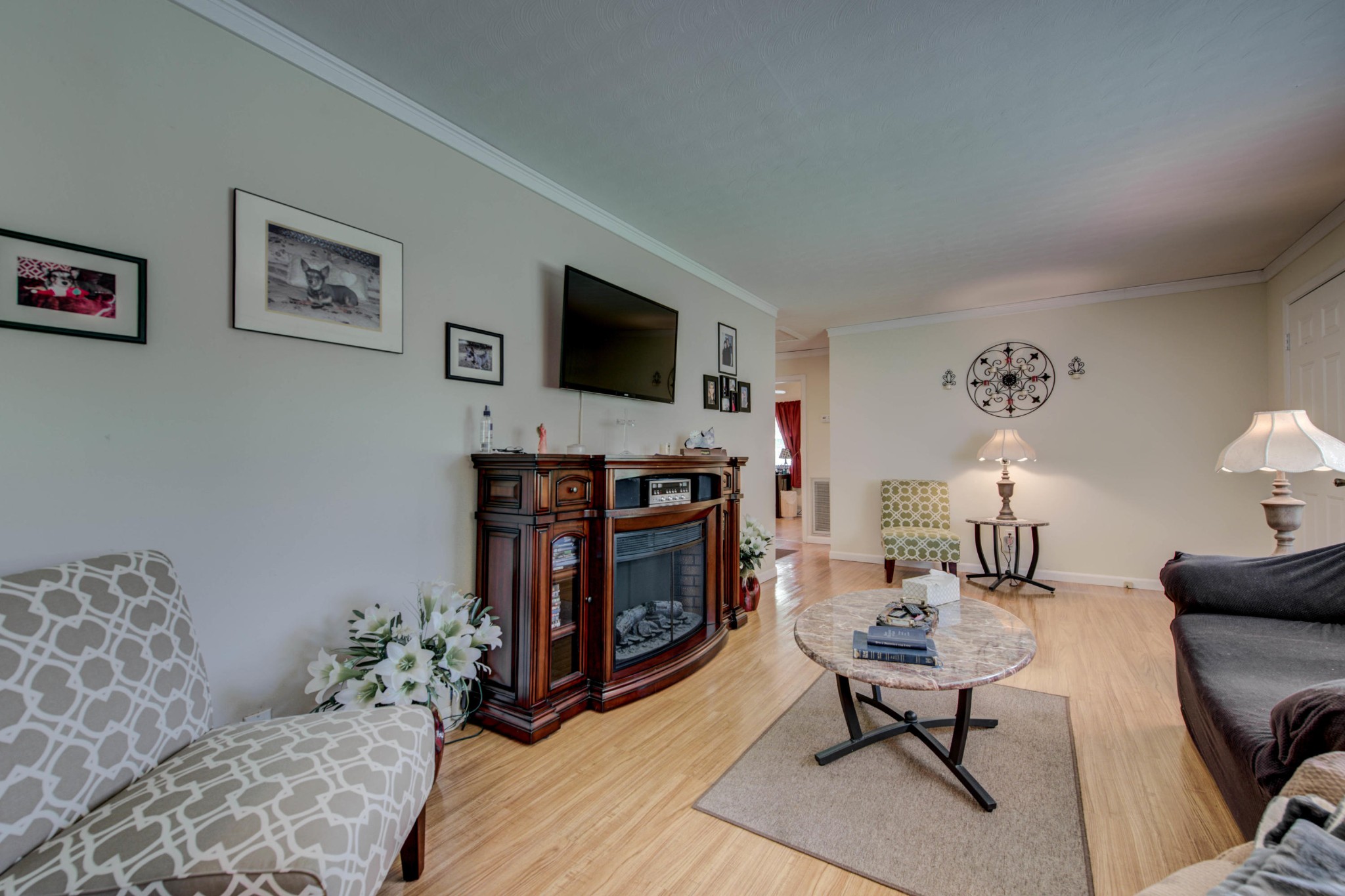 517 Foust Carney Road Powell, TN 37849 - Photo 6 of 28 a living room with furniture and a flat screen tv