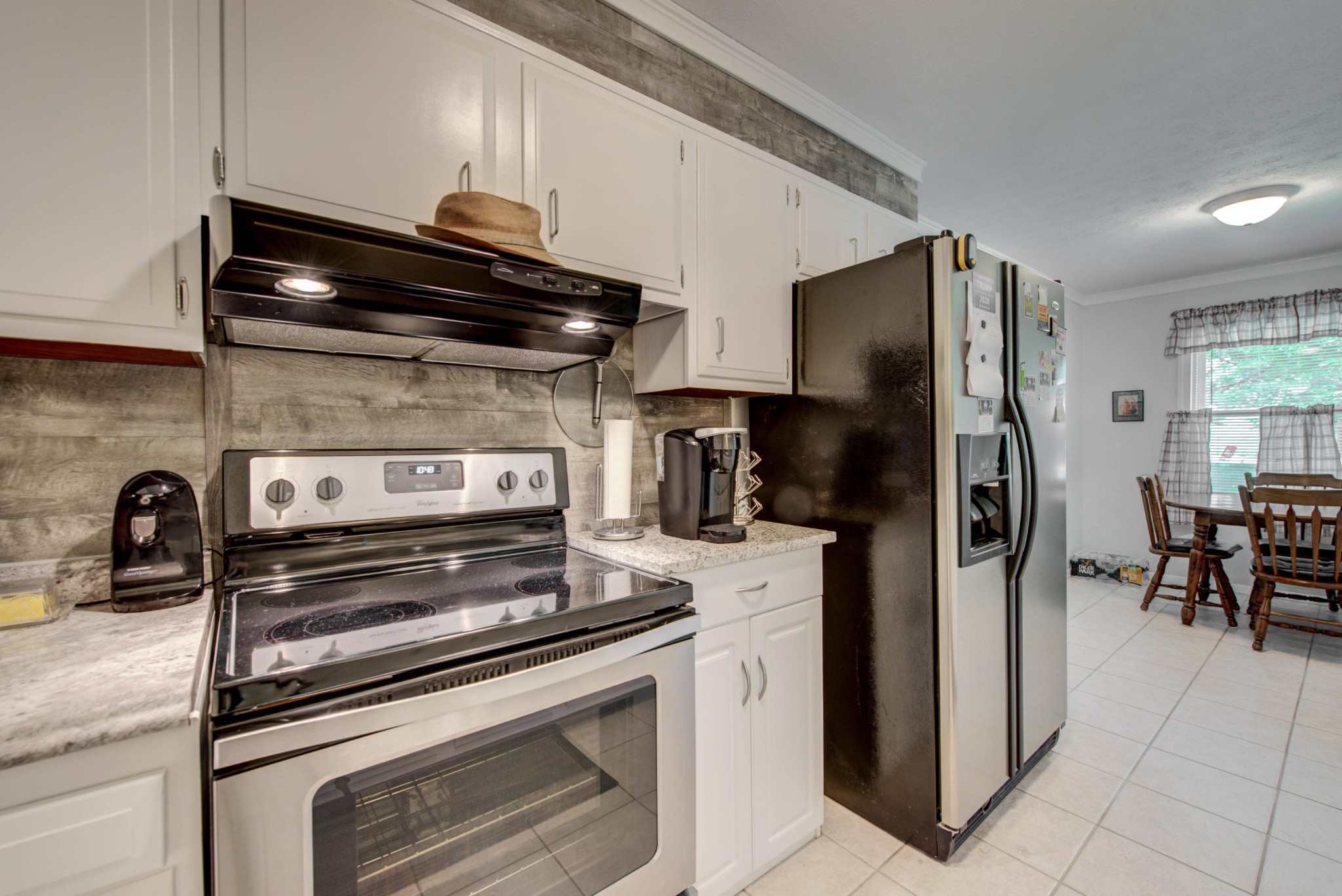 517 Foust Carney Road Powell, TN 37849 - Photo 10 of 28 a kitchen with appliances and cabinets
