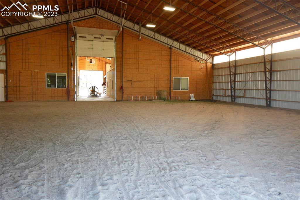 19625 Drennan Road Colorado Springs, CO 80928 - Photo 38 of 50 Indoor Arena with kitchen with 1/2 bath.