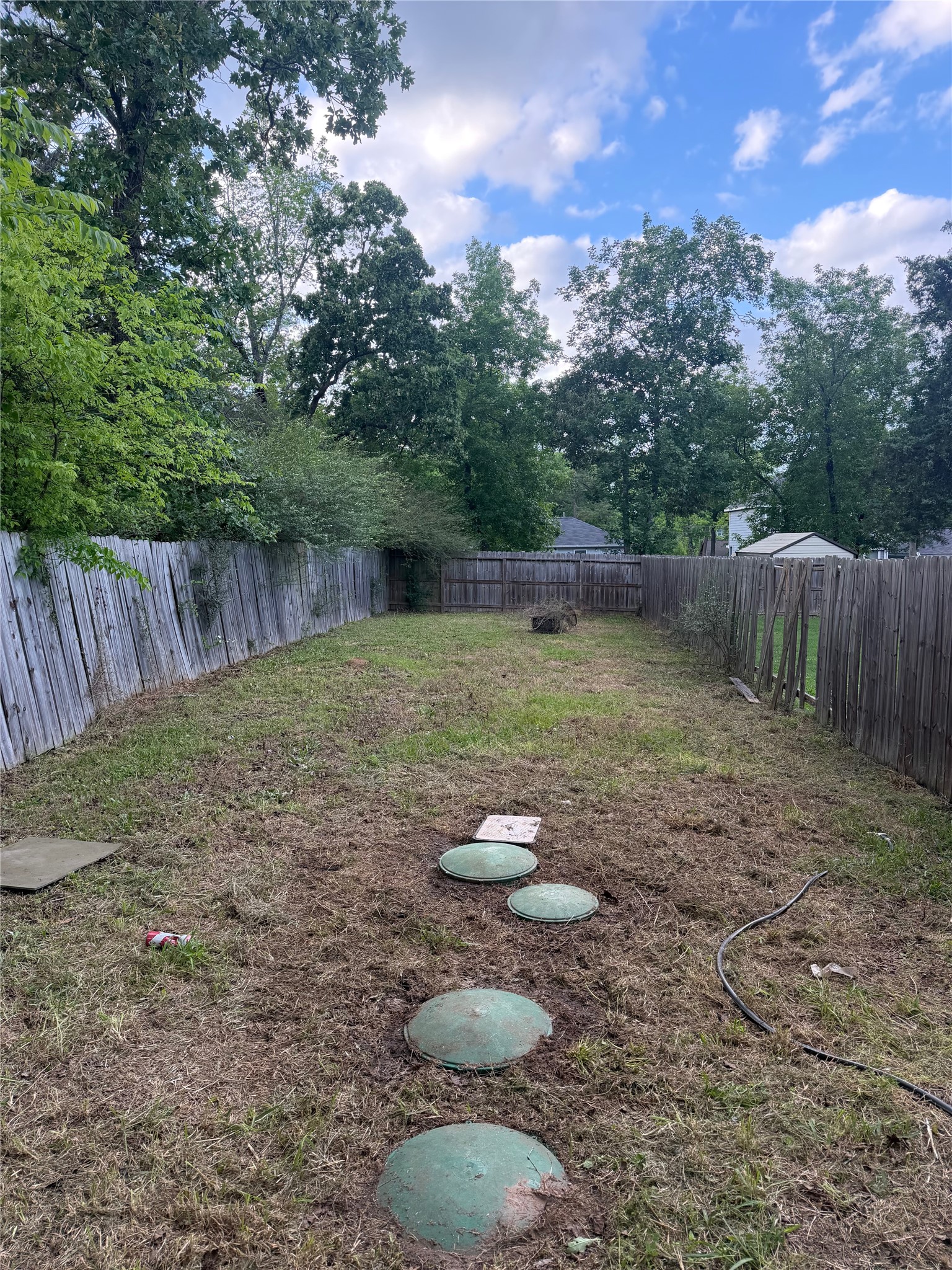 4139 Sam Houston Road Willis, TX 77378 - Photo 25 of 26 The rear yard is extremely spacious and fully fenced.