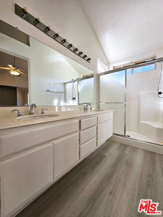 7254 Brienza Place Rancho Cucamonga, CA 91701 - Photo 14 of 17 a bathroom with a sink and a mirror