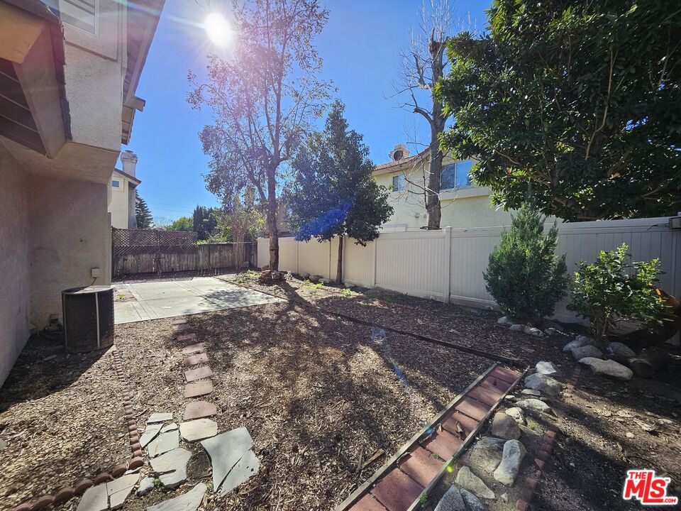 7254 Brienza Place Rancho Cucamonga, CA 91701 - Photo 17 of 17 a view of a backyard with large trees