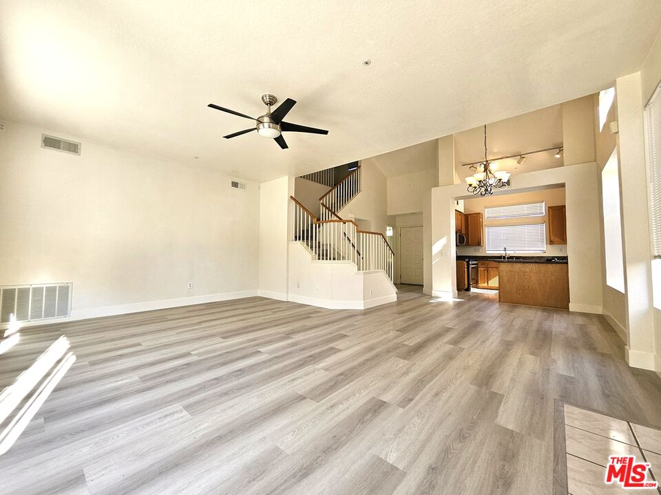 7254 Brienza Place Rancho Cucamonga, CA 91701 - Photo 4 of 17 a view of a livingroom with a fireplace
