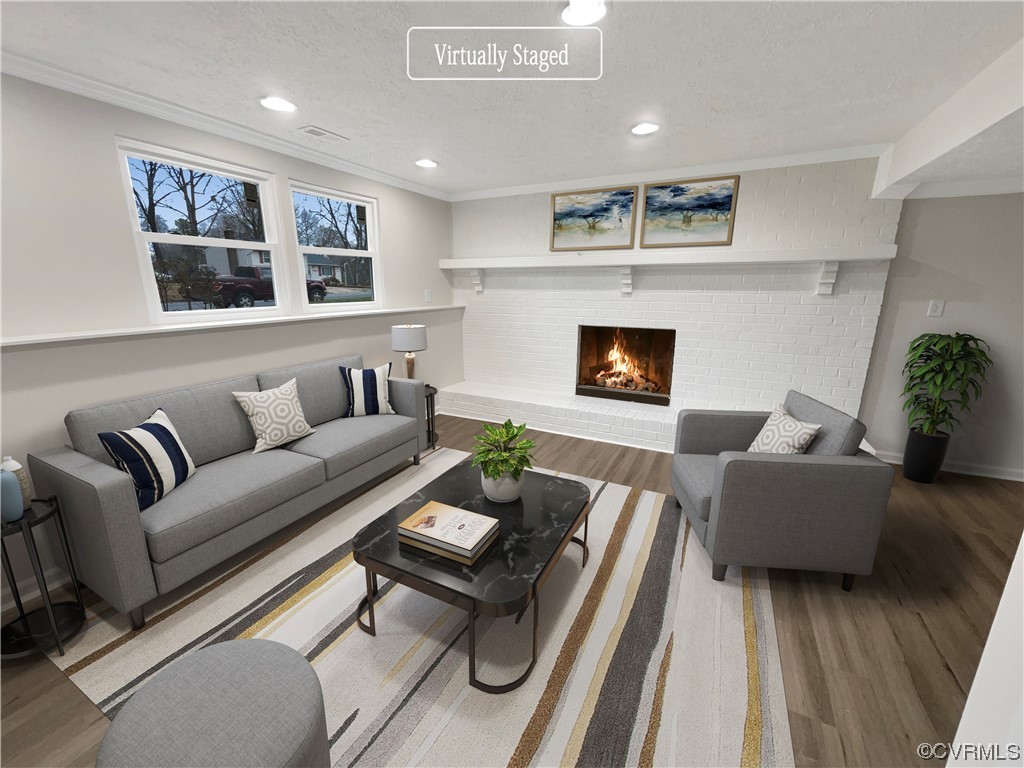 9407 Emmett Road Glen Allen, VA 23060 - Photo 2 of 18 a living room with furniture and a fireplace