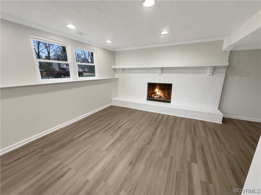 9407 Emmett Road Glen Allen, VA 23060 - Photo 3 of 18 a view of a big room with wooden floor and windows