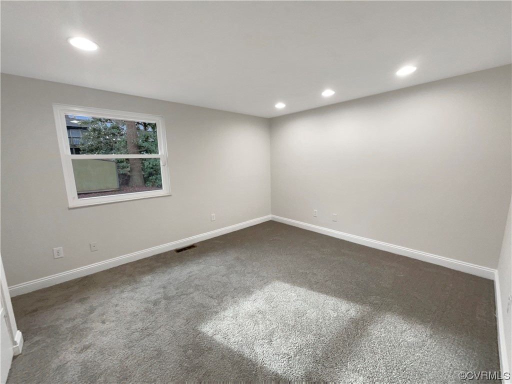 9407 Emmett Road Glen Allen, VA 23060 - Photo 10 of 18 an empty room with a window