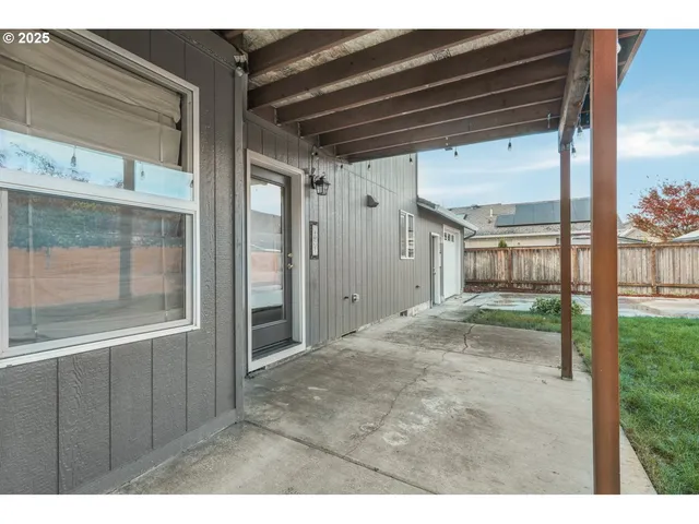 a house view with a garden space