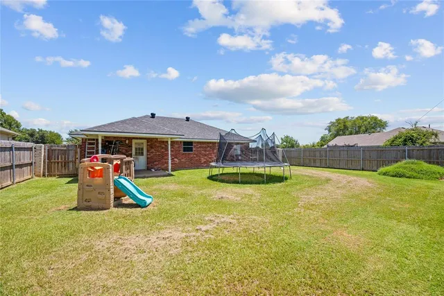 a view of a swimming pool with a slide