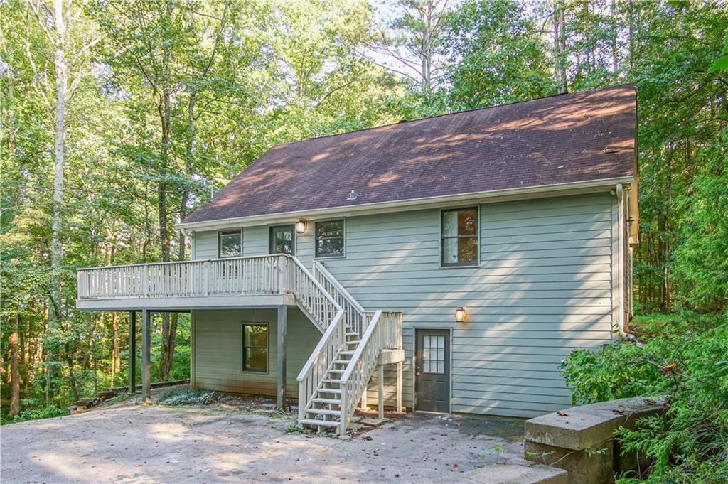 1706 Cochran Ridge Road Hiram, GA 30141 - Photo 1 of 1 a view of a house with a balcony