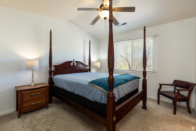 6 300th Road North, Unit I6 Kanab, UT 84741 - Photo 20 of 37 Bedroom featuring a ceiling fan, vaulted ceiling, and light carpet