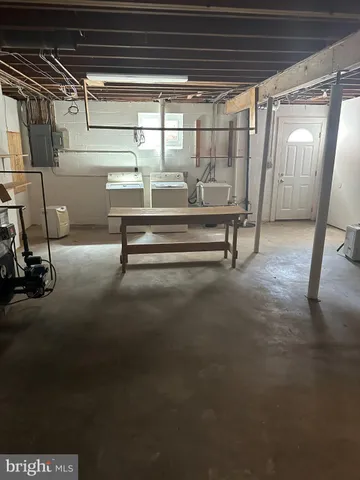 a sitting area with wooden racks