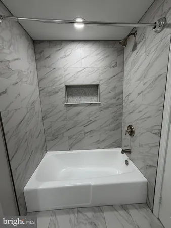 a bathroom with a bathtub