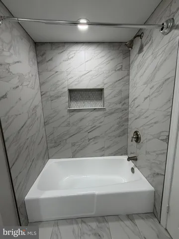 a bathroom with a bathtub