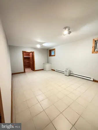 a view of a room with natural light