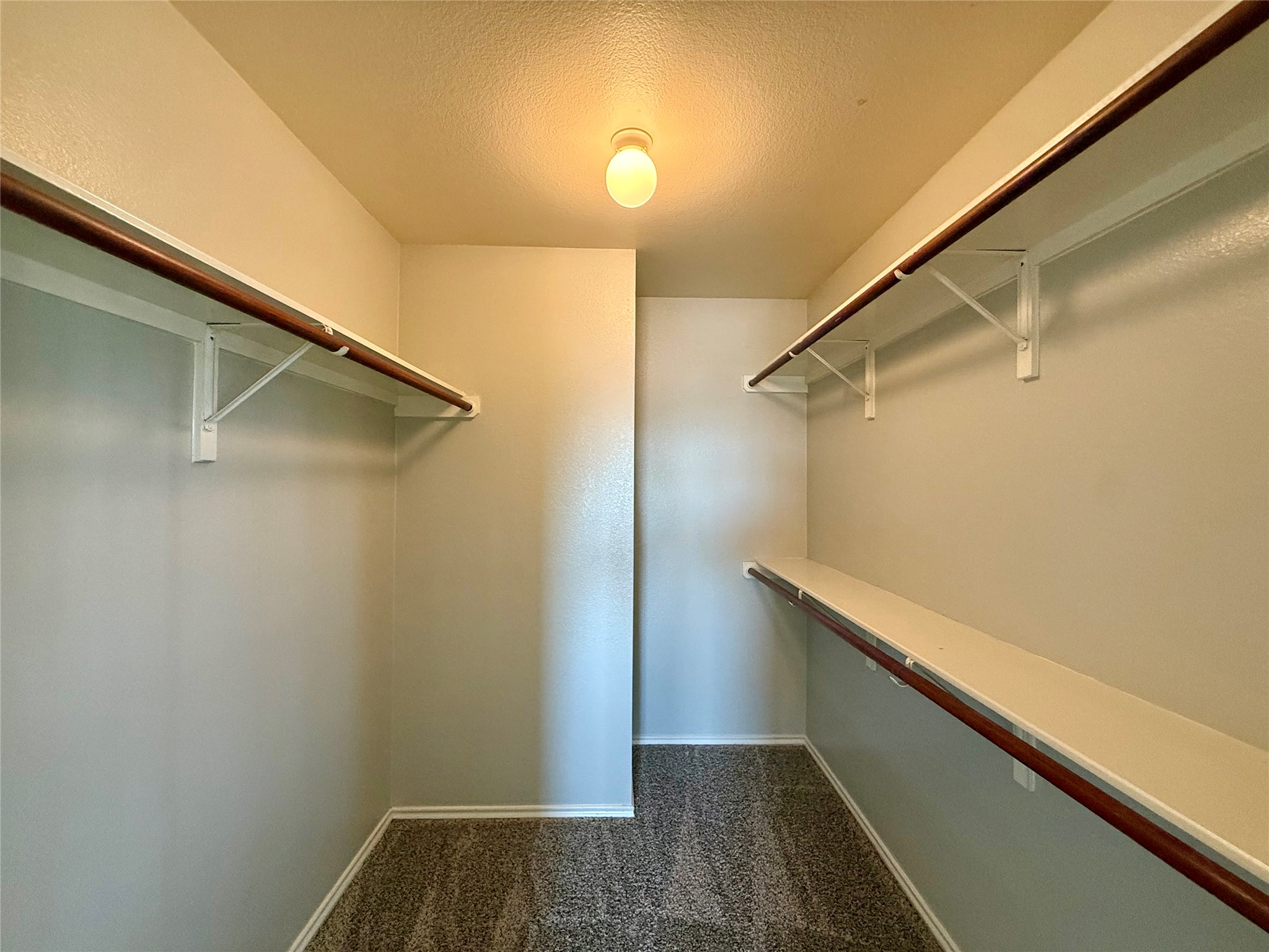 6912 Meador Avenue, Unit A Austin, TX 78752 - Photo 16 of 24 a view of closet with white walls