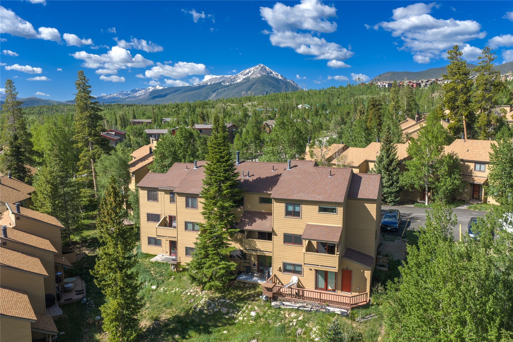 6726 Ryan Gulch Road, Unit 6726 Wildernest, CO 80498 - Photo 4 of 39 a view of a city with a building in the background