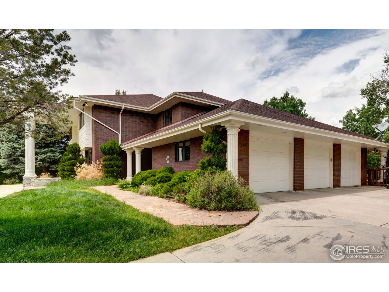 1909 Homestead Road Greeley, CO 80634 - Photo 2 of 38 Front