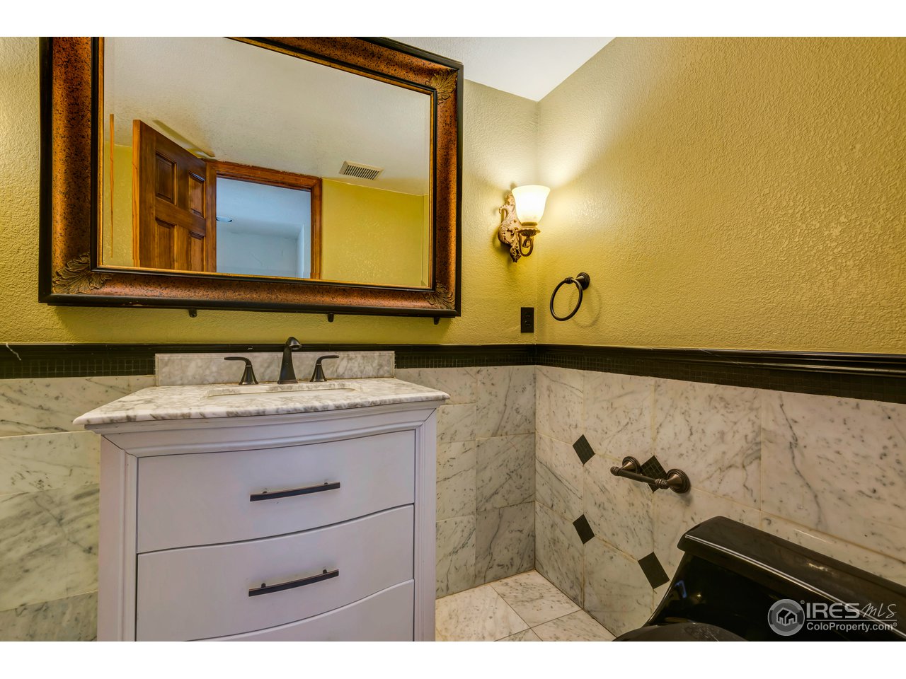 1909 Homestead Road Greeley, CO 80634 - Photo 6 of 38 Bathroom 1