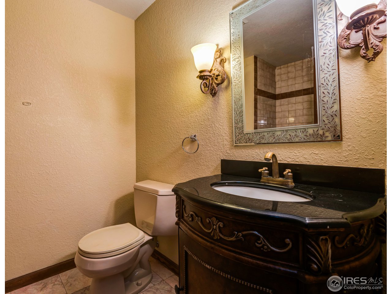 1909 Homestead Road Greeley, CO 80634 - Photo 9 of 38 Downstairs bathroom
