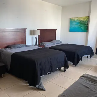 a view of a dining room with furniture and window