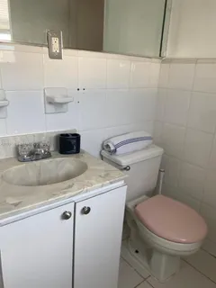 a view of storage and utility room with empty racks