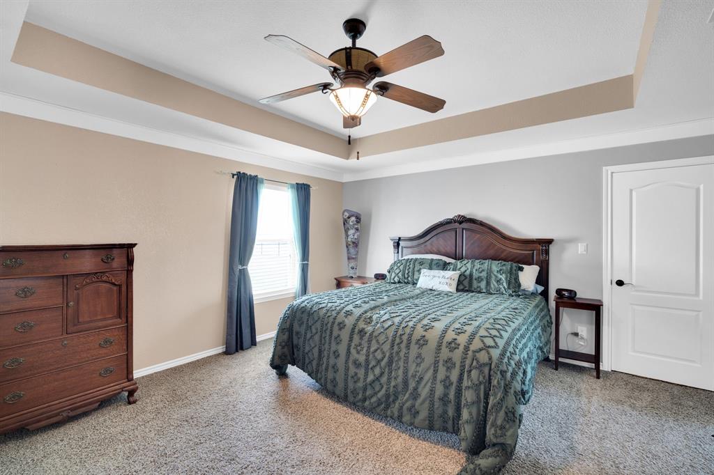 130 Eubanks Road Maypearl, TX 76064 - Photo 12 of 39 a bedroom with a bed and window