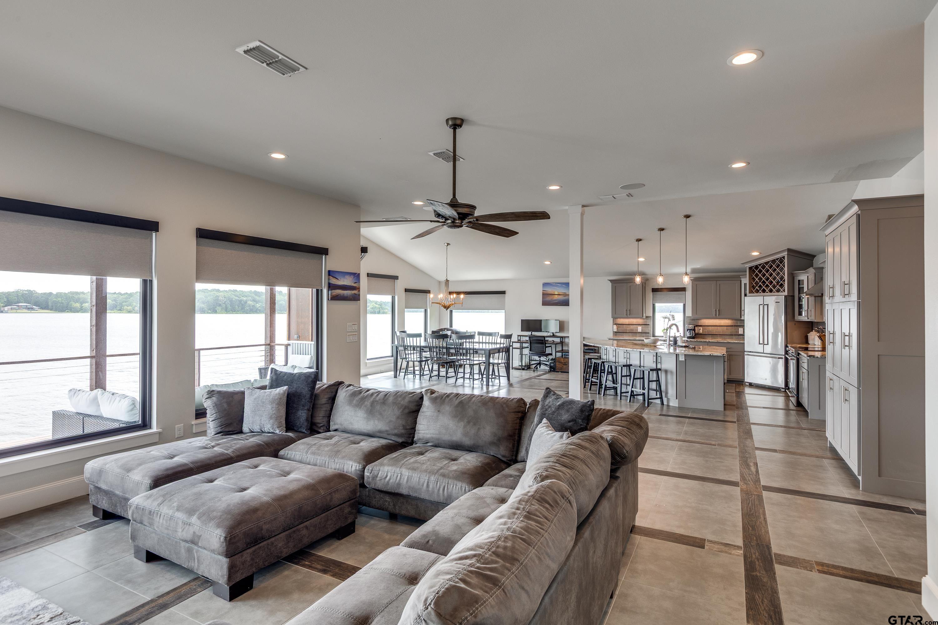 16822 Perry Street Tyler, TX 75707 - Photo 25 of 45 a living room with furniture and kitchen view