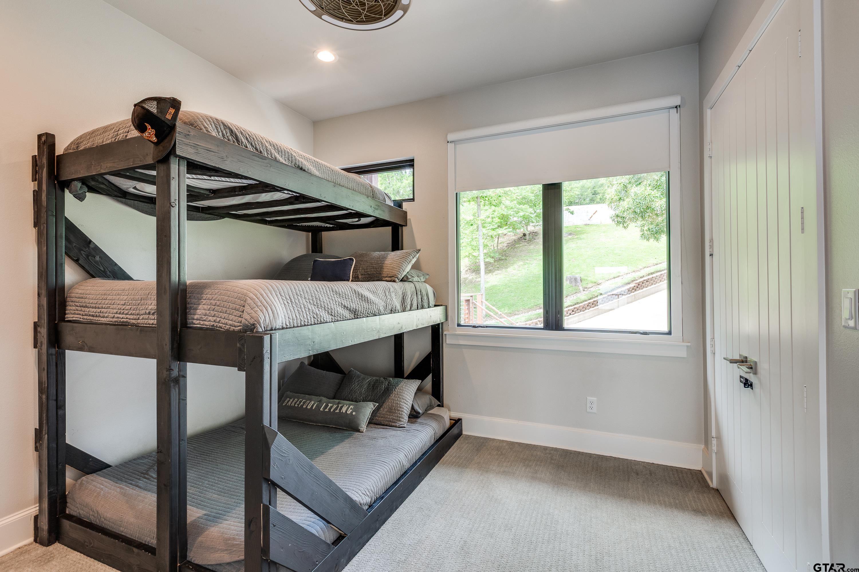 16822 Perry Street Tyler, TX 75707 - Photo 38 of 45 a bedroom with furniture and a window