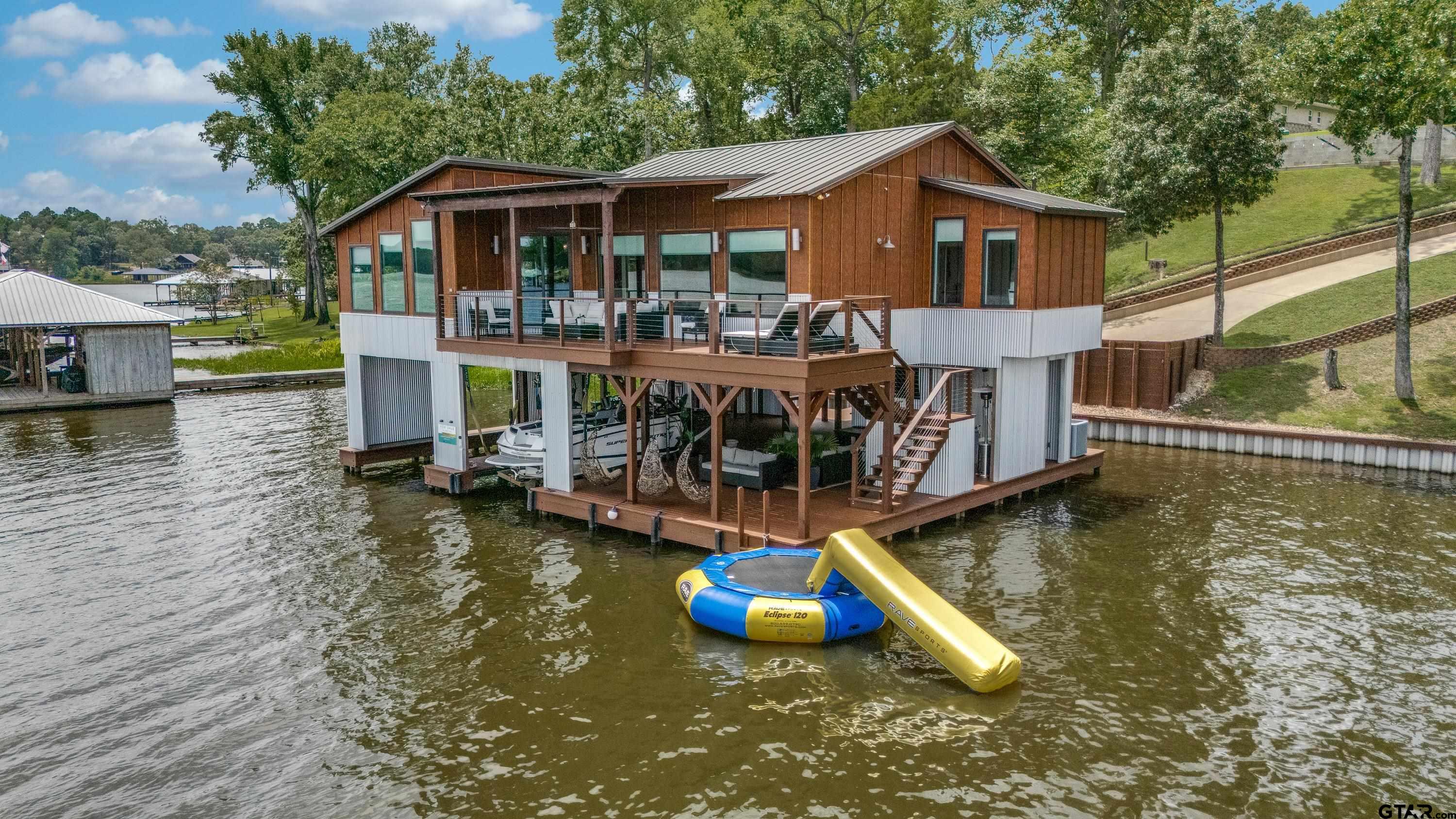16822 Perry Street Tyler, TX 75707 - Photo 42 of 45 a view of a house with pool and chairs