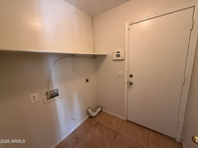 a view of a hallway with closet