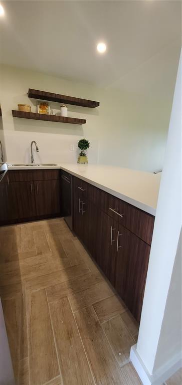 5100 Southwest 90th Avenue, Unit 406 Cooper City, FL 33328 - Photo 23 of 25 a kitchen with a sink and cabinets