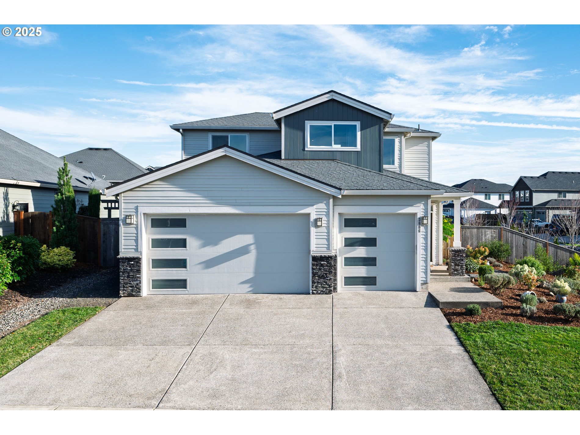3606 Northeast Oriole Street Camas, WA 98607 - Photo 1 of 48 a front view of a house with a yard and garage
