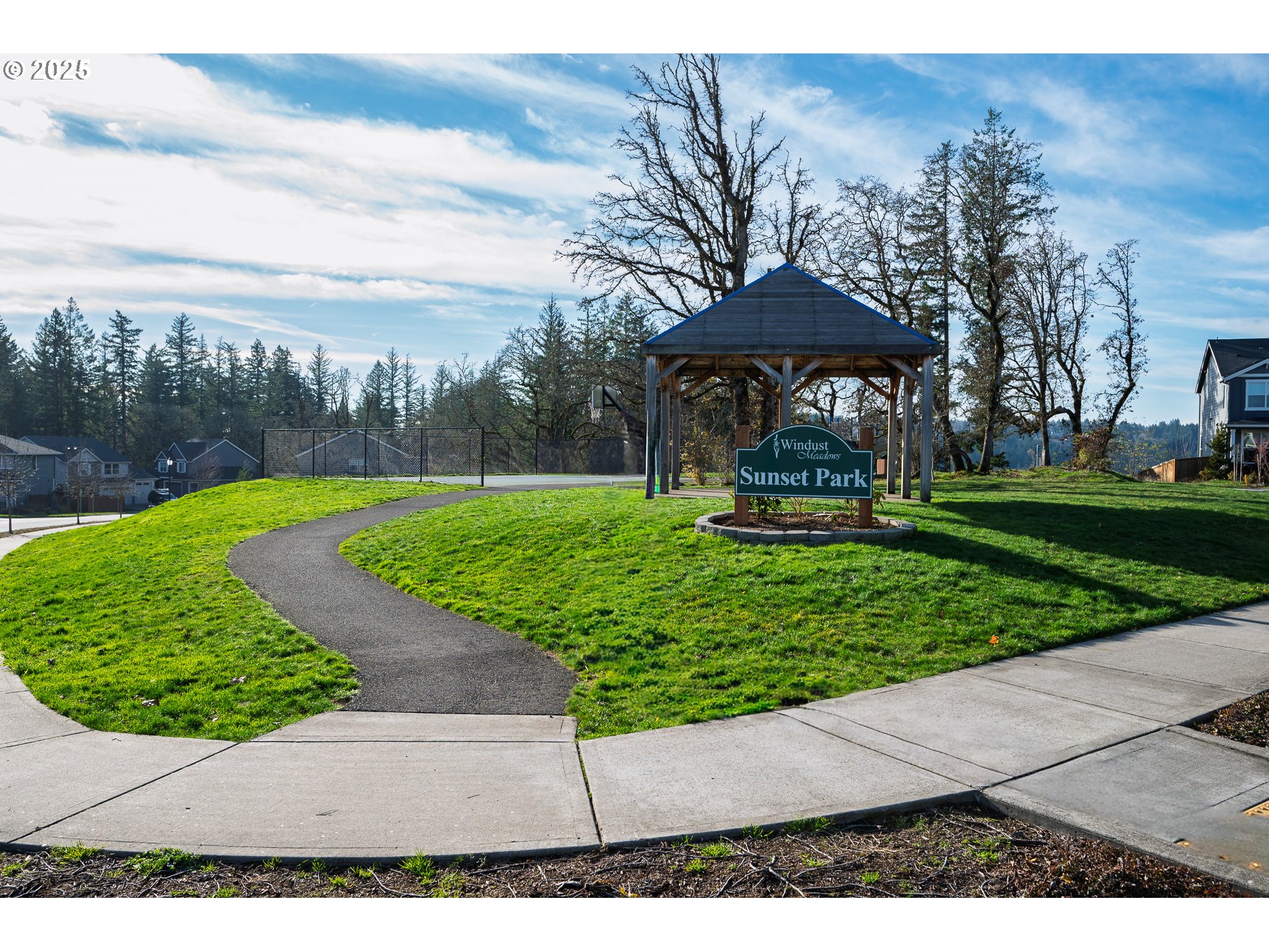 3606 Northeast Oriole Street Camas, WA 98607 - Photo 23 of 48 a view of a garden with a bench in a garden