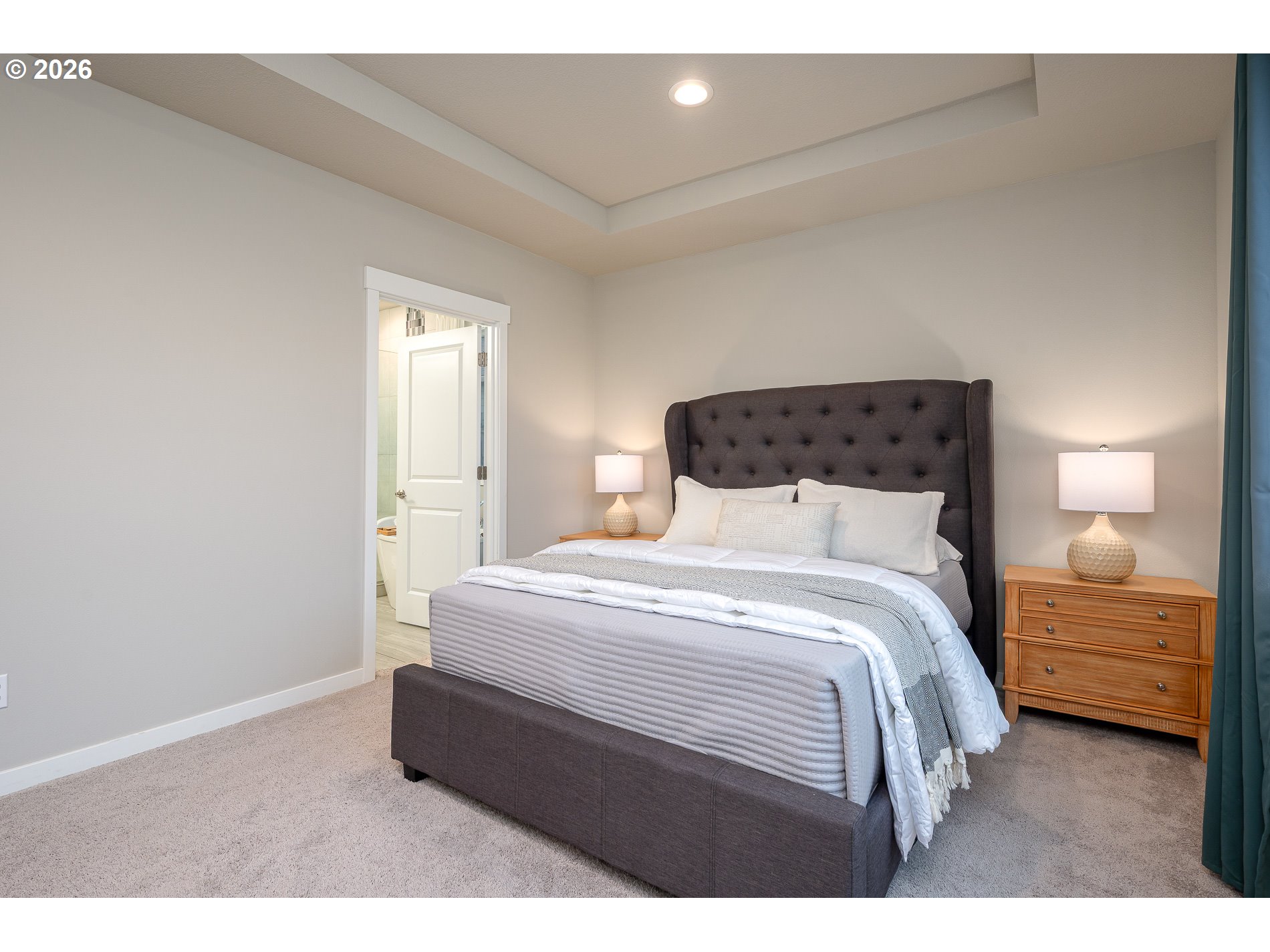 3606 Northeast Oriole Street Camas, WA 98607 - Photo 31 of 48 a bedroom with a bed and a lamp