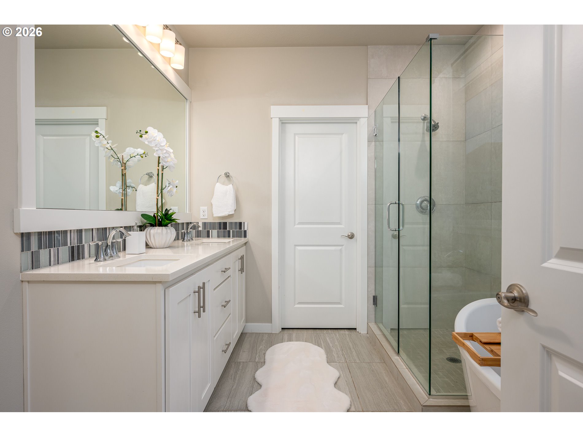 3606 Northeast Oriole Street Camas, WA 98607 - Photo 32 of 48 a bathroom with a sink and a mirror