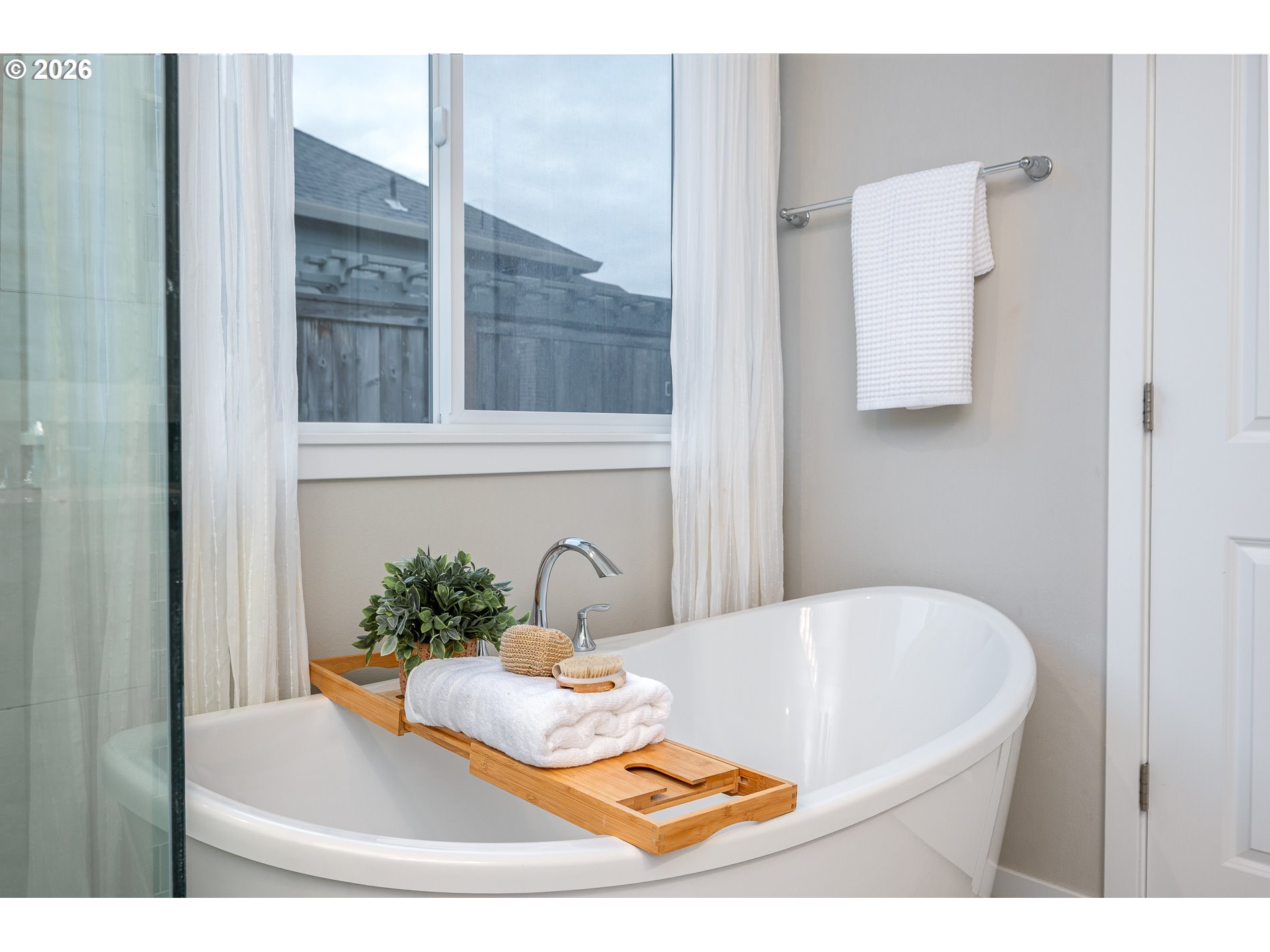 3606 Northeast Oriole Street Camas, WA 98607 - Photo 35 of 48 a white bath tub sitting next to a white sink