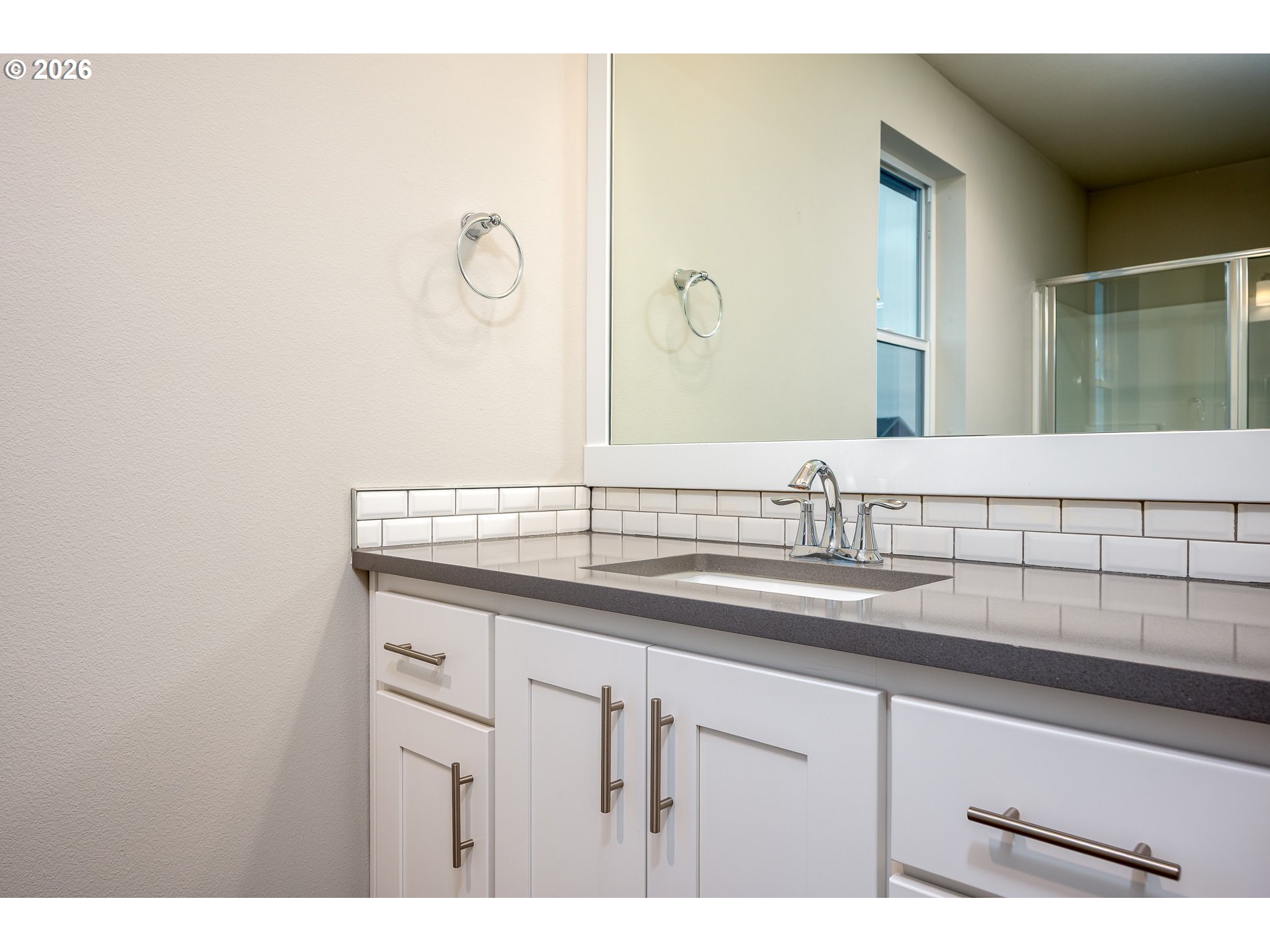 3606 Northeast Oriole Street Camas, WA 98607 - Photo 39 of 48 a bathroom with a sink and a mirror