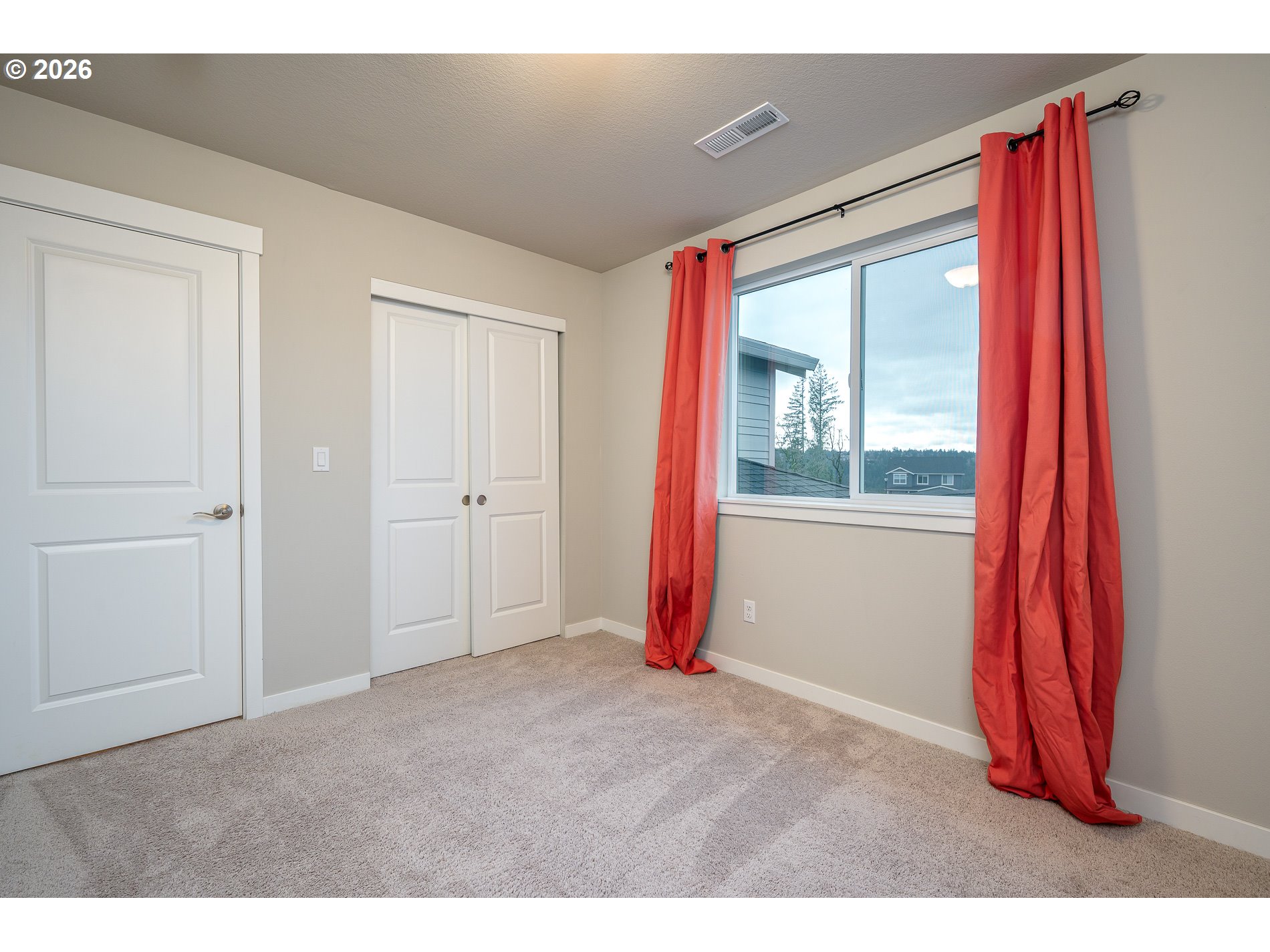 3606 Northeast Oriole Street Camas, WA 98607 - Photo 40 of 48 a view of a bedroom with a bed and wooden floor