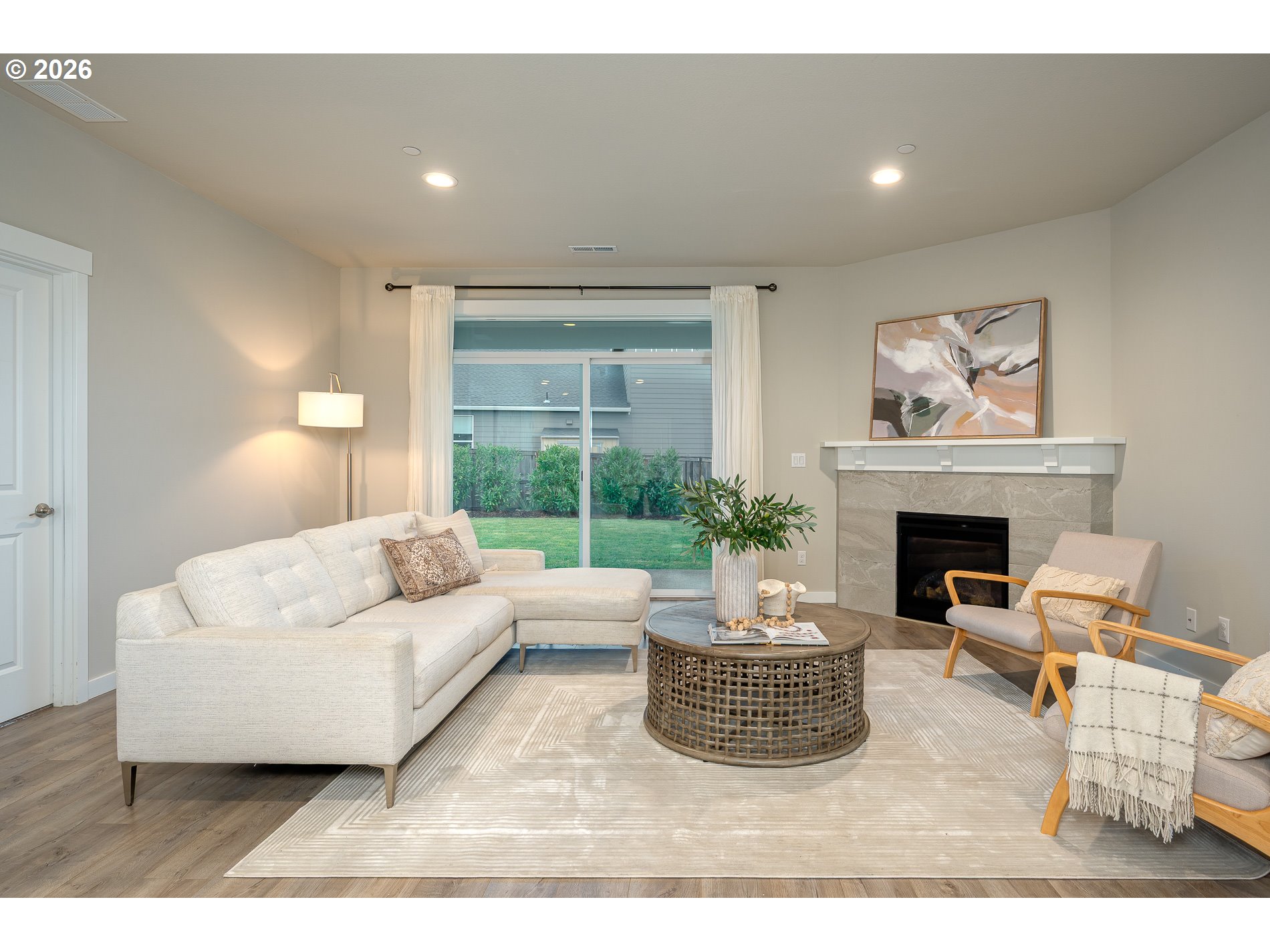 3606 Northeast Oriole Street Camas, WA 98607 - Photo 46 of 48 a living room with furniture and a fireplace