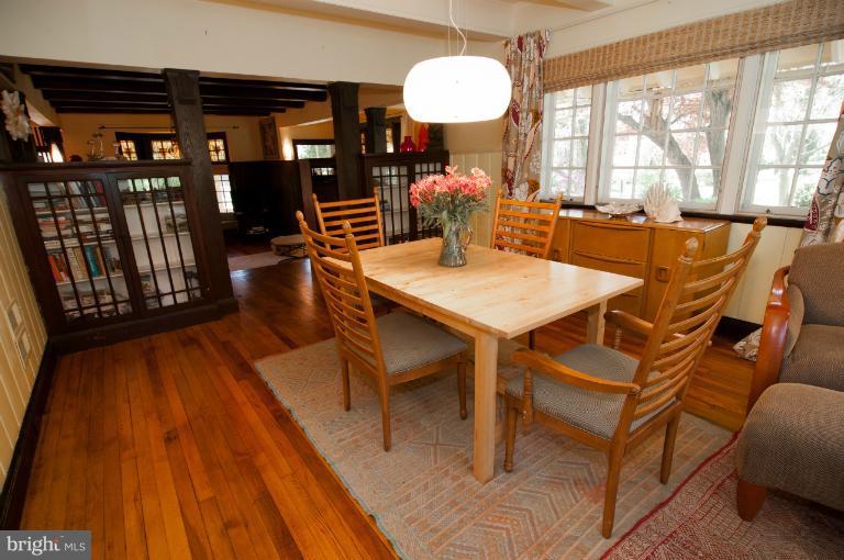 8 St Johns Road Baltimore, MD 21210 - Photo 10 of 18 a view of a dining room with furniture window and wooden floor