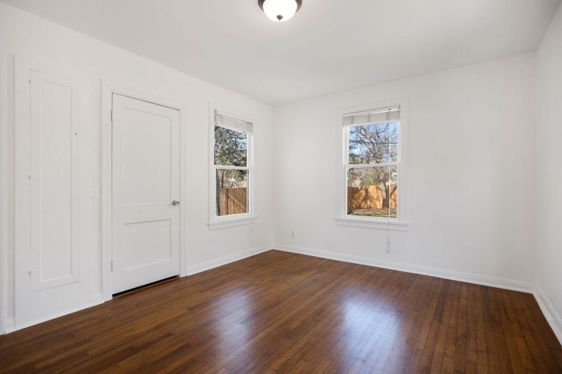 1704 Northwood Road Austin, TX 78703 - Photo 11 of 22 a view of a room with wooden floor and window