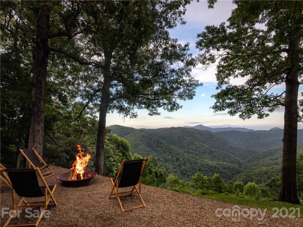 318 Summer Haven Lane Saluda, NC 28773 - Photo 25 of 40 a view of a outdoor space with furniture and garden